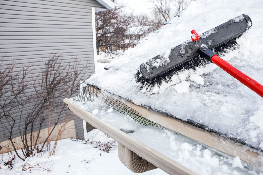Use proper tools such as shovels, ice scrapers, and salt to melt ice.