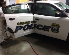 PuroClean technician cleans green bay police car