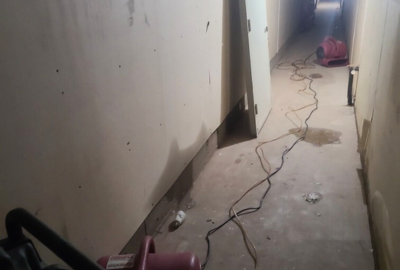 PuroClean of Green Bay technicians cleaning and restoring a commercial property after water damage