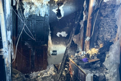 Professional emergency fire damage cleanup services restoring residential property after a fire.