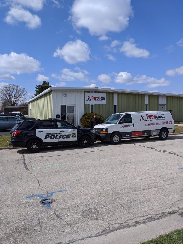 PuroClean volunteers to deep clean patrol cars during pandemic.
