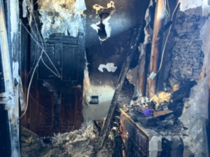 Professional emergency fire damage cleanup services restoring residential property after a fire.