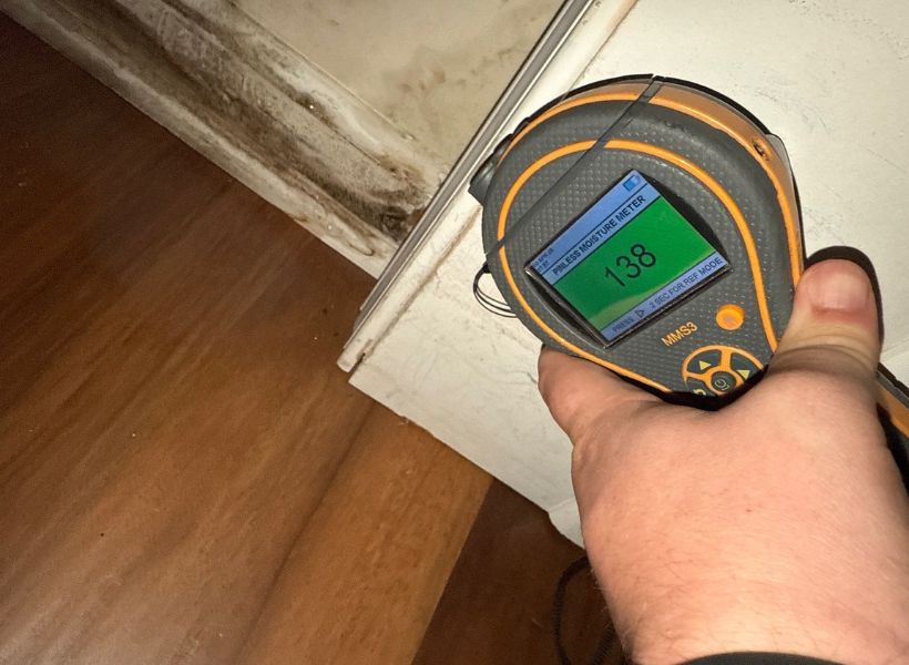 water-damaged walls and baseboards