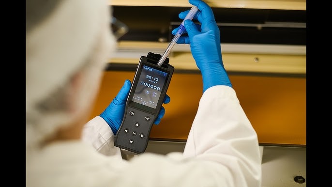 technician using an ATP hygiene monitoring device to verify that a surface in a Hapeville home is biologically clean