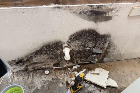Moisture damage discovered behind kitchen cabinetry
