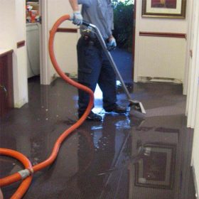 water restoration technicians working inside residential home Atlanta Georgia
