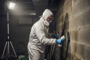 Certified mold remediation specialist setting up containment in a South Atlanta residence