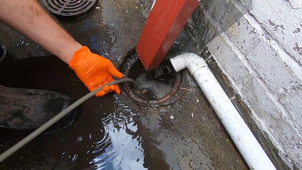 clogged sewage backup repair