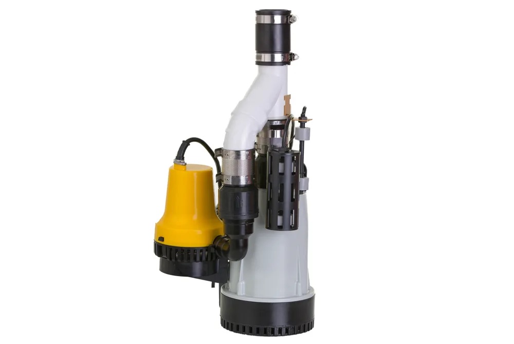 Submersible sump pump with float switch and PVC discharge pipe used for basement water removal and flood prevention.