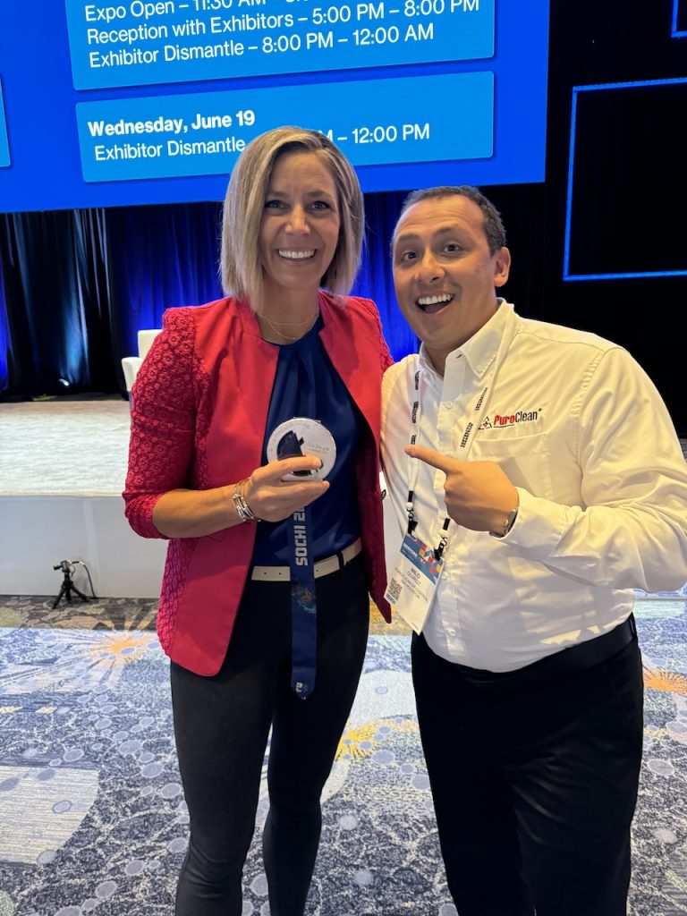 Nilo meeting Olympic gold medalist Noelle Pikus-Pace at Contractor Connection 2024.