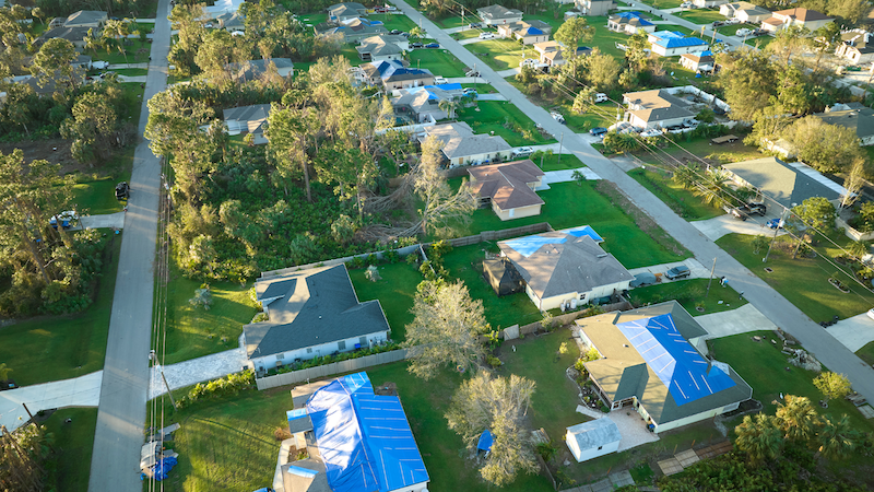 Tarps on Houston houses