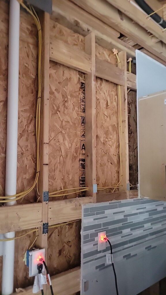 inside of the wall after the drywall was removed the remediate the water damage caused by the leak
