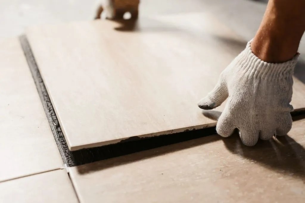 removing water damaged tiles may be necassary to prevent further damge to the structure of your home on long island
