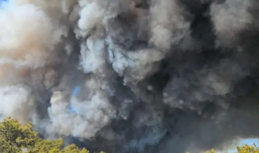 Wild fires spread across eastern long island sending smoke and soot across the state
