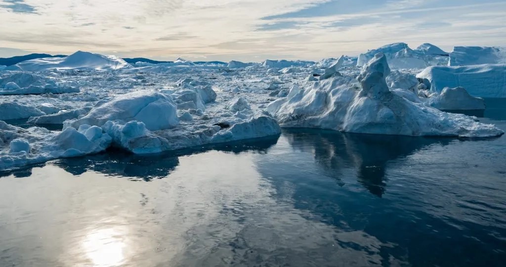 Climate change and warming temperatures leading to ice melt and rising water table