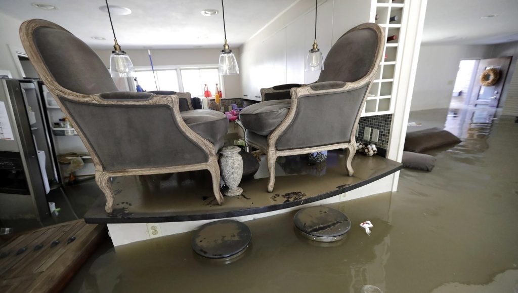 Living room flooded by heavy spring time rain