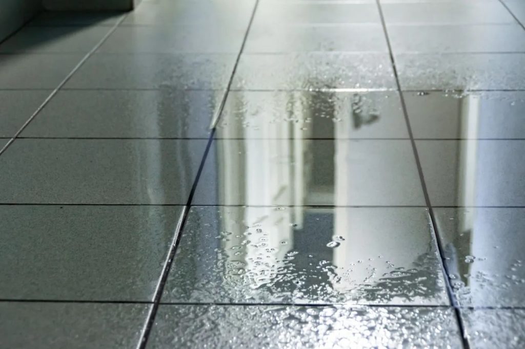 Tile can be vunerable to water damage if it is not sealed properly causing water to leak below and get trapped