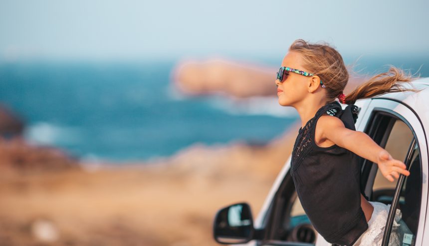 This woman is enjoying her vacation and is away from her home.
