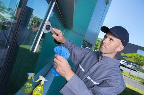 man performing spring maintenance cleaning