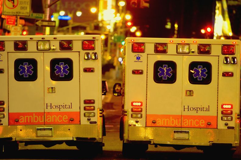 two ambulances driving side by side