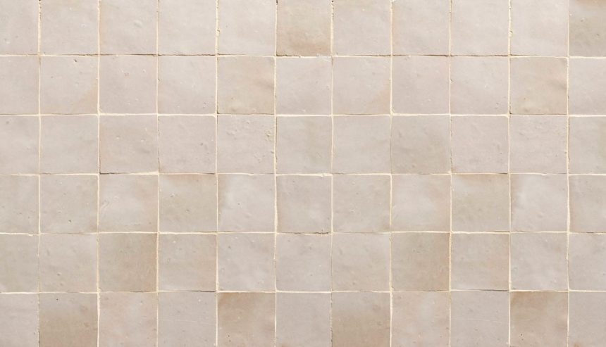 Water damage to tiles in bathroom