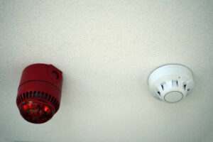Strobe light smoke alarm and typical fire alarm