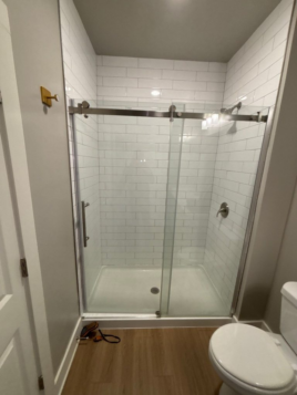 best showers to fight water damage? glass door shower