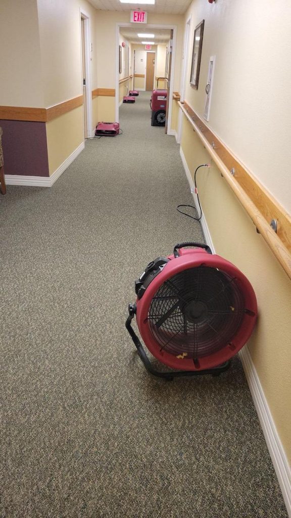 Fans used to dry halls from water damage