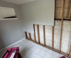 Mold remediation, long beach, drywall cut out to where mold growth stops, structure being dried by fans while HEPA filter cleans the air