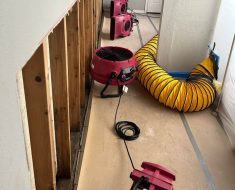 Water mitigation and mold remediation in long beach, air blowers drying the structure in containment.