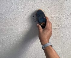 Water mitigation in Long Beach, intial free inspection, noninvasive moisture meter showing drywall is saturated with water
