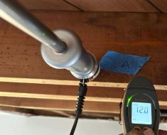 invasive moisture meter showing the dry standard for wood framing in this home.