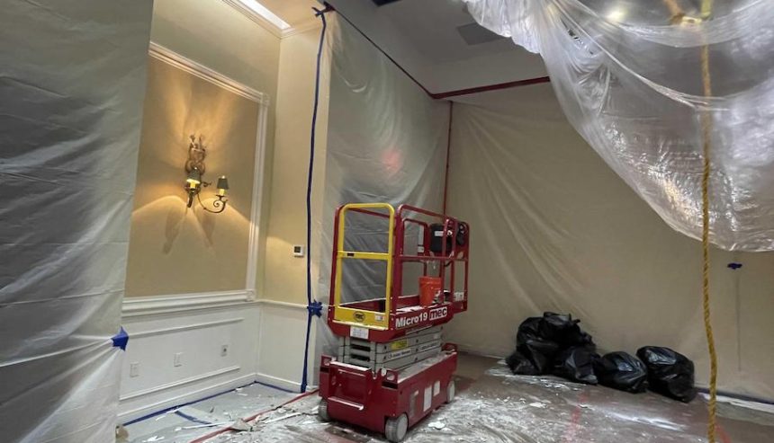 scalfolding set up in senior living facility in Deland, FL to handle condensation leak from A/C unit.