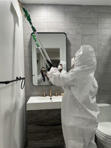 Physician-led restoration technician working in a Huntington Park home