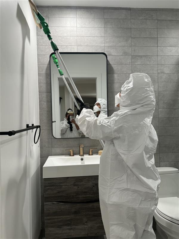 Physician-led restoration technician working in a Huntington Park home