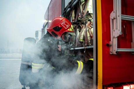 Firefighter ready for mission with full gear