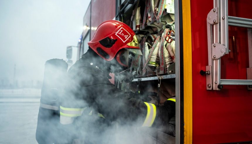 Firefighter ready for mission with full gear