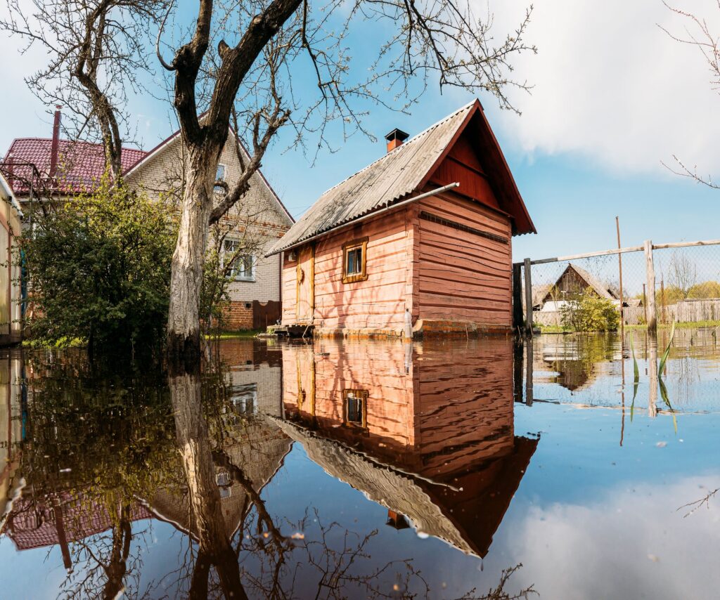 Wooden sauna building flooded during spring thaw
