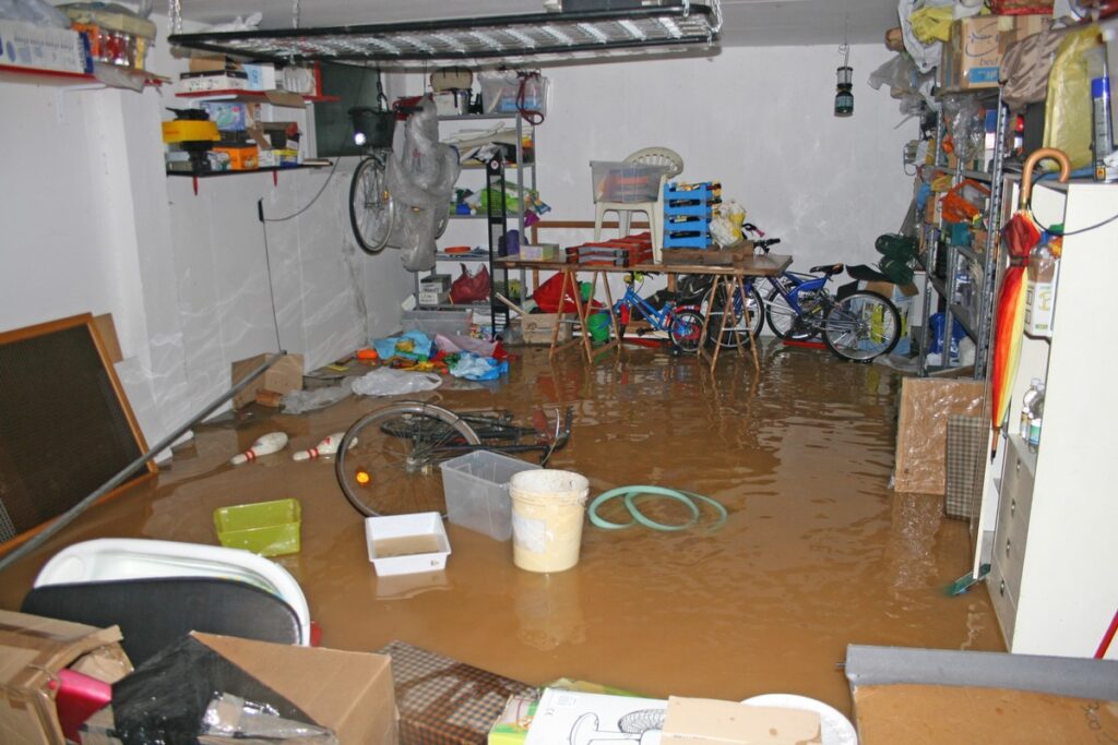 Murky contaminated water flooding a home's lower level after a sewage backup