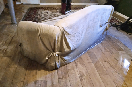 Water logged sofa and rug to be thrown out after flood