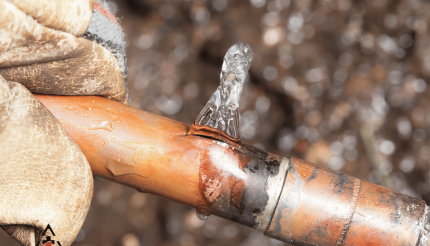 frozen pipe with ice poking from burt section
