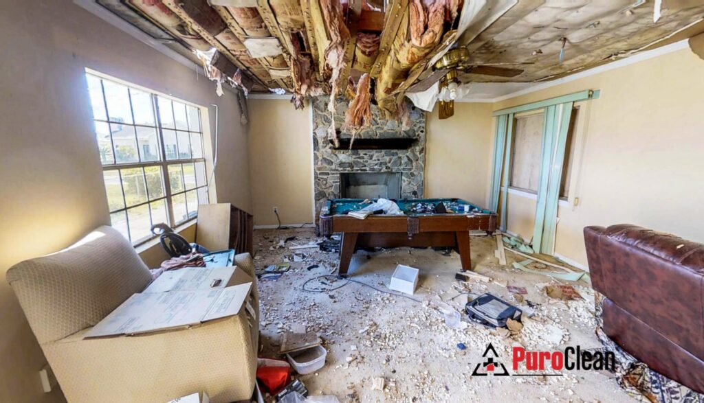 charred living room ready for cleanup after a fire