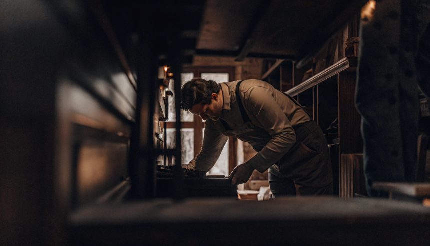 Professional performing hoarding cleanup services inside a residential property