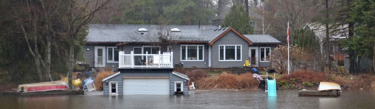 Flooded home. Spring flooding prevention is important during the months between winter and summer.
