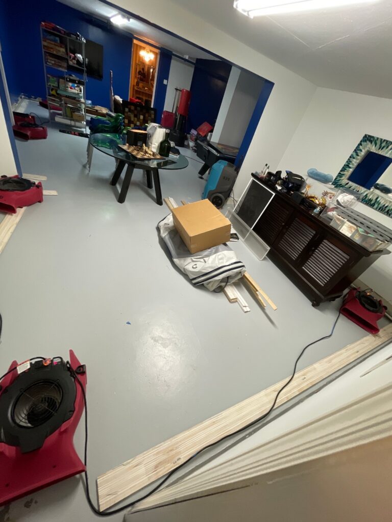 Drying the water in the flooded basement.