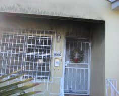 Soot outside home before fire damage remediation process by PuroClean of South Miami Miami FL
