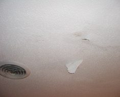 Roof peeling before water damage remediation by PuroClean of South Miami Miami FL