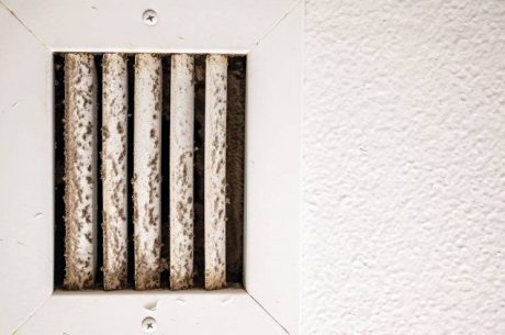 dust on a ceiling air duct - a sign you might have mold in HVAC system