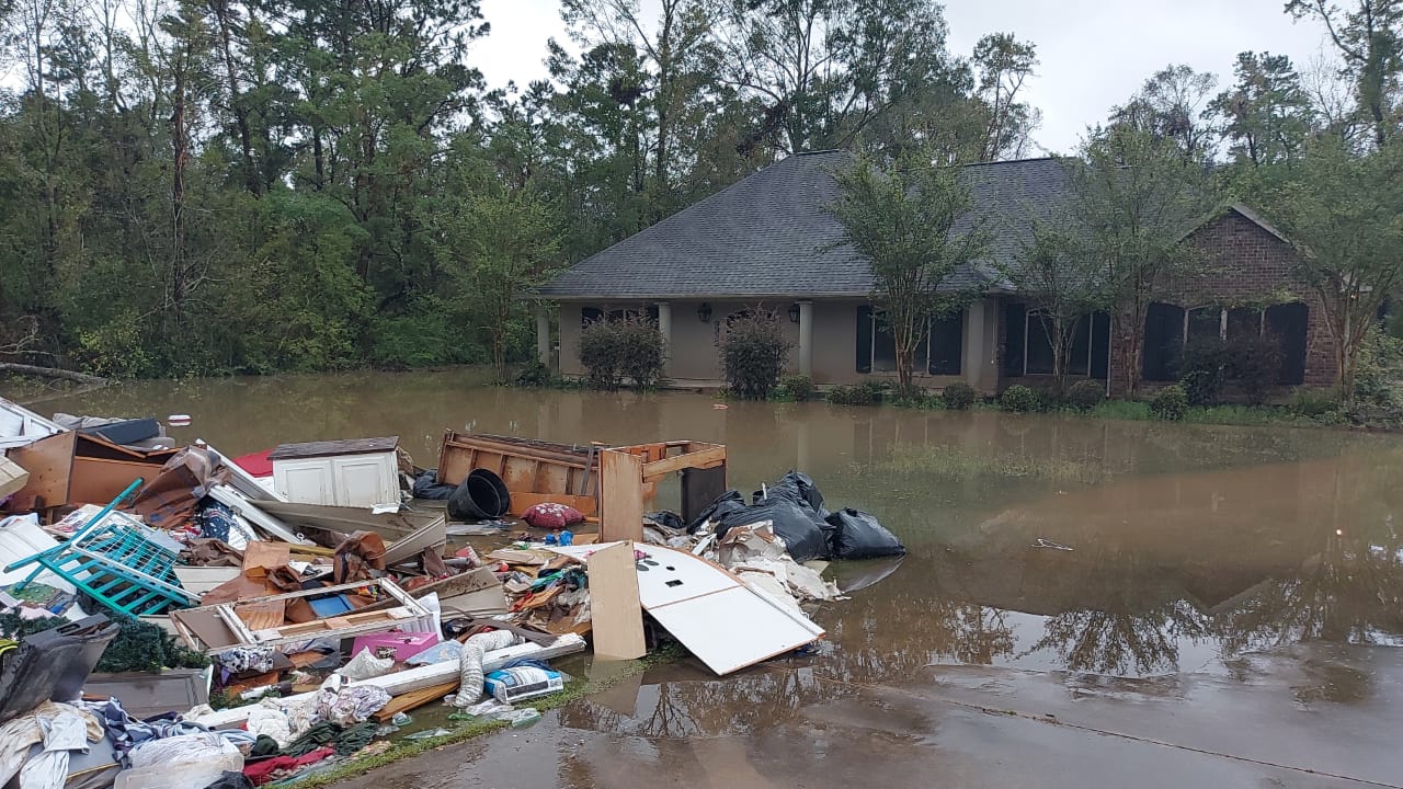 Flooded Home Drowns Out the Excitement of New Engagement for Louisiana Couple