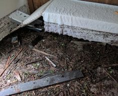 Room covered in dirt for water damage remediation process by PuroClean of Naples Naples FL